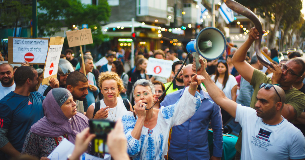 "לא שווים פחות מתושבי תל אביב", מפגינים ביפו לפני כחודש | צילום: לני בן בסט