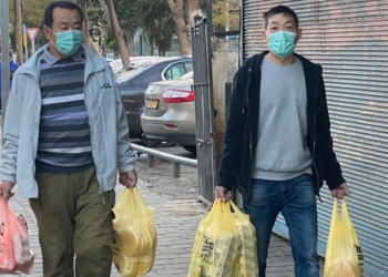 מהגרי עבודה ומבקשי מקלט בנווה שאנן | צילום: עינת פישביין