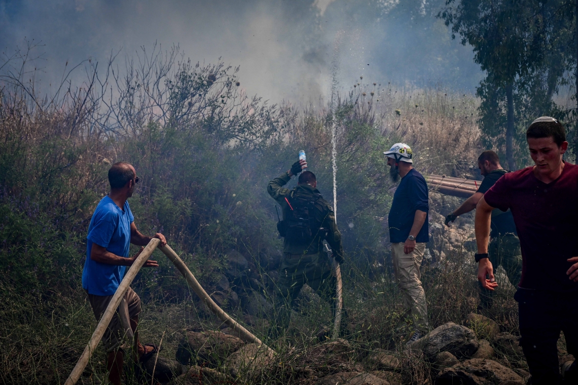 בין נפילה לנפילה ובין שריפה לשריפה, המשפחות של אנשי כיתות הכוננות קורסות | צילום: מיכאל גלעד, פלאש 90