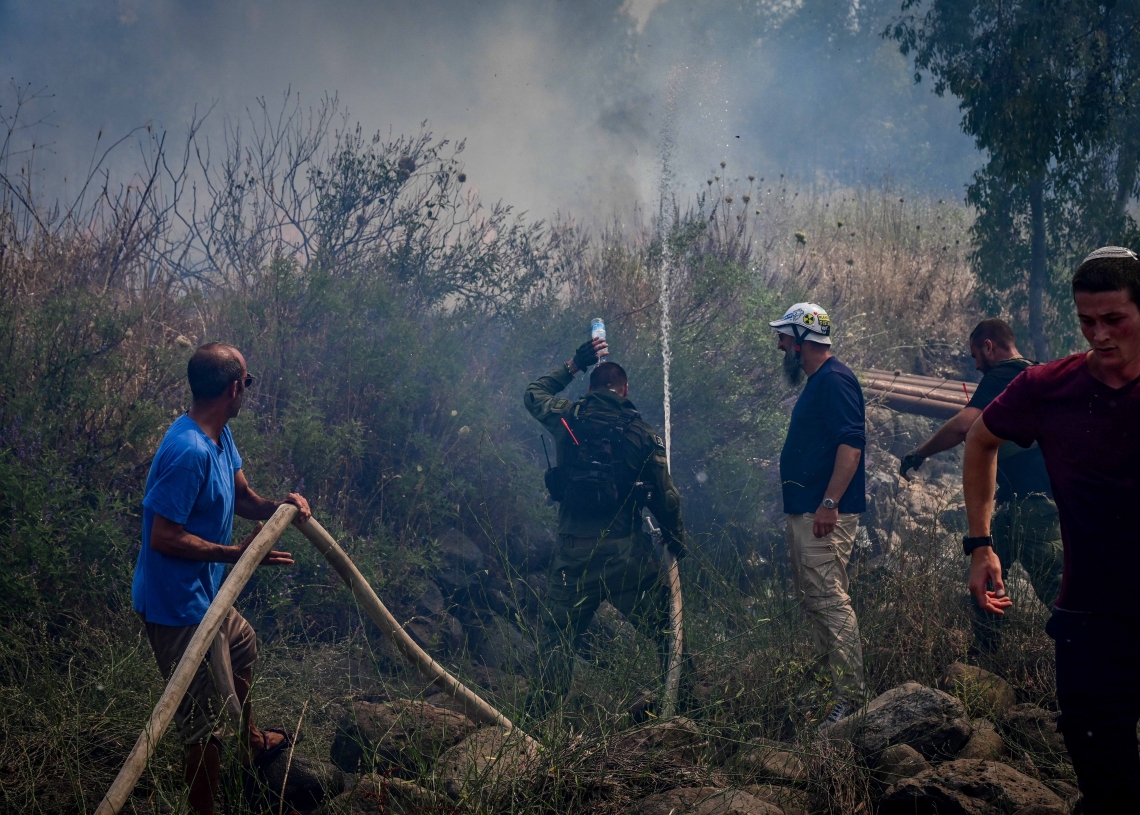 בין נפילה לנפילה ובין שריפה לשריפה, המשפחות של אנשי כיתות הכוננות קורסות | צילום: מיכאל גלעד, פלאש 90