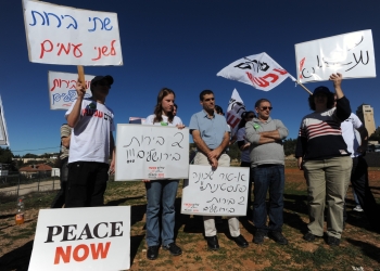 Some 30 Peace Now activists protested in front of the Beit Orot Yeshiva, next to the al-Tur neighborhood in east Jerusalem against the building of a residential complex on the site. The protestors were carrying signs that read "Beit Orot – irreversible damage," and were promising to continue coming to the site in coming weeks in a bid to stop the complex from being built. Twenty-four housing units were authorized this week by Jerusalem municipality to house yeshiva students on the premises.